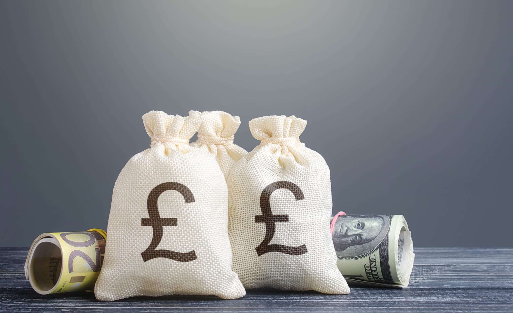 GBP currency money bag. Image source - Shutterstock